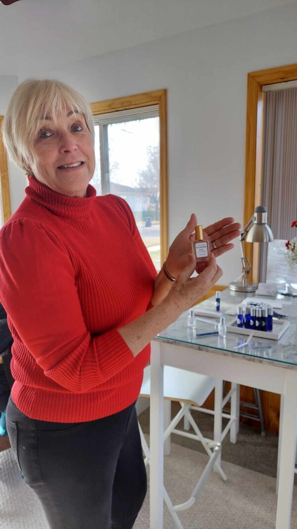 Nancy showing her custom perfume