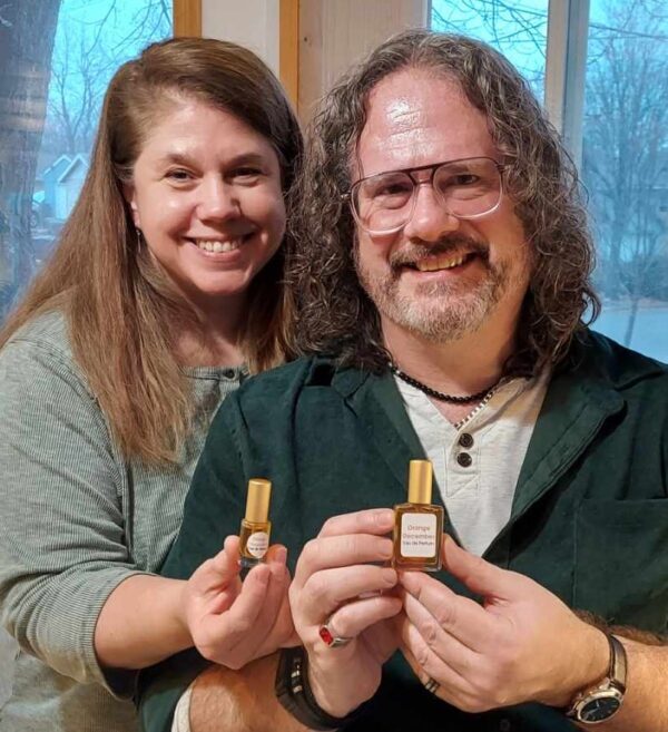 Mike and Mel showing their custom fragrances